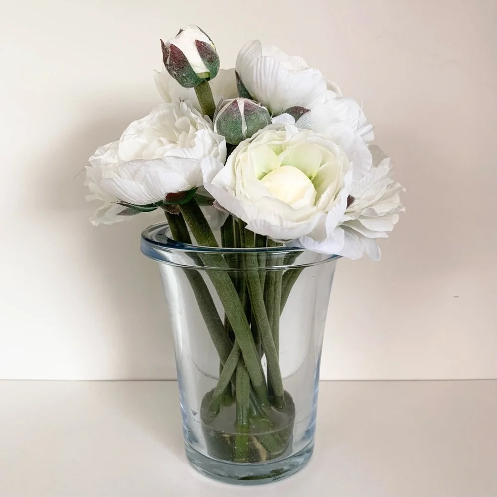 Thomas O’Brien Faux flowers in blue glass vase